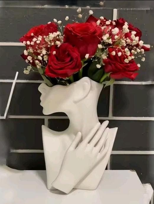 FLORERO ROSTRO DE MUJER