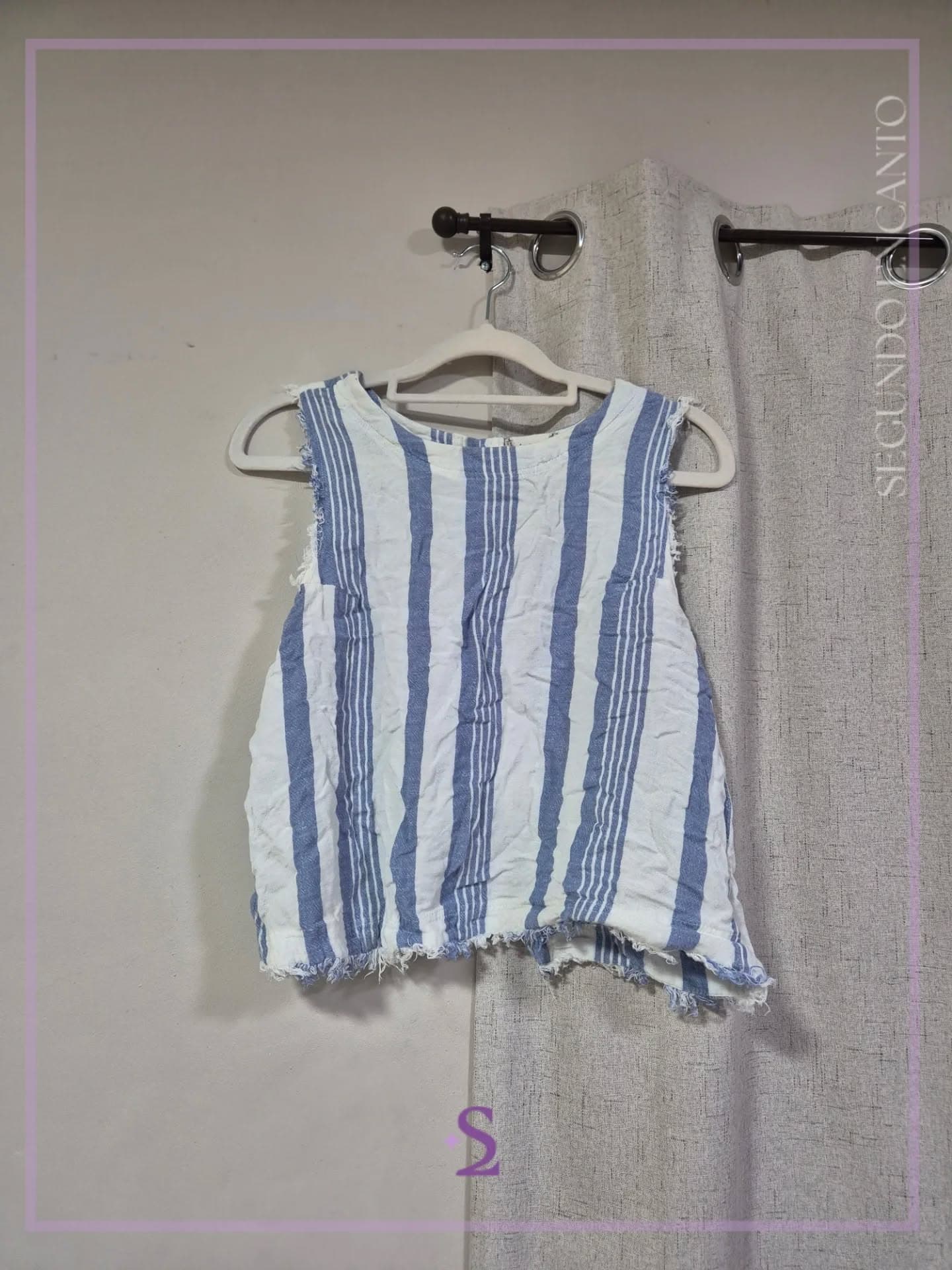 Blusa con botones en la parte trasera M
