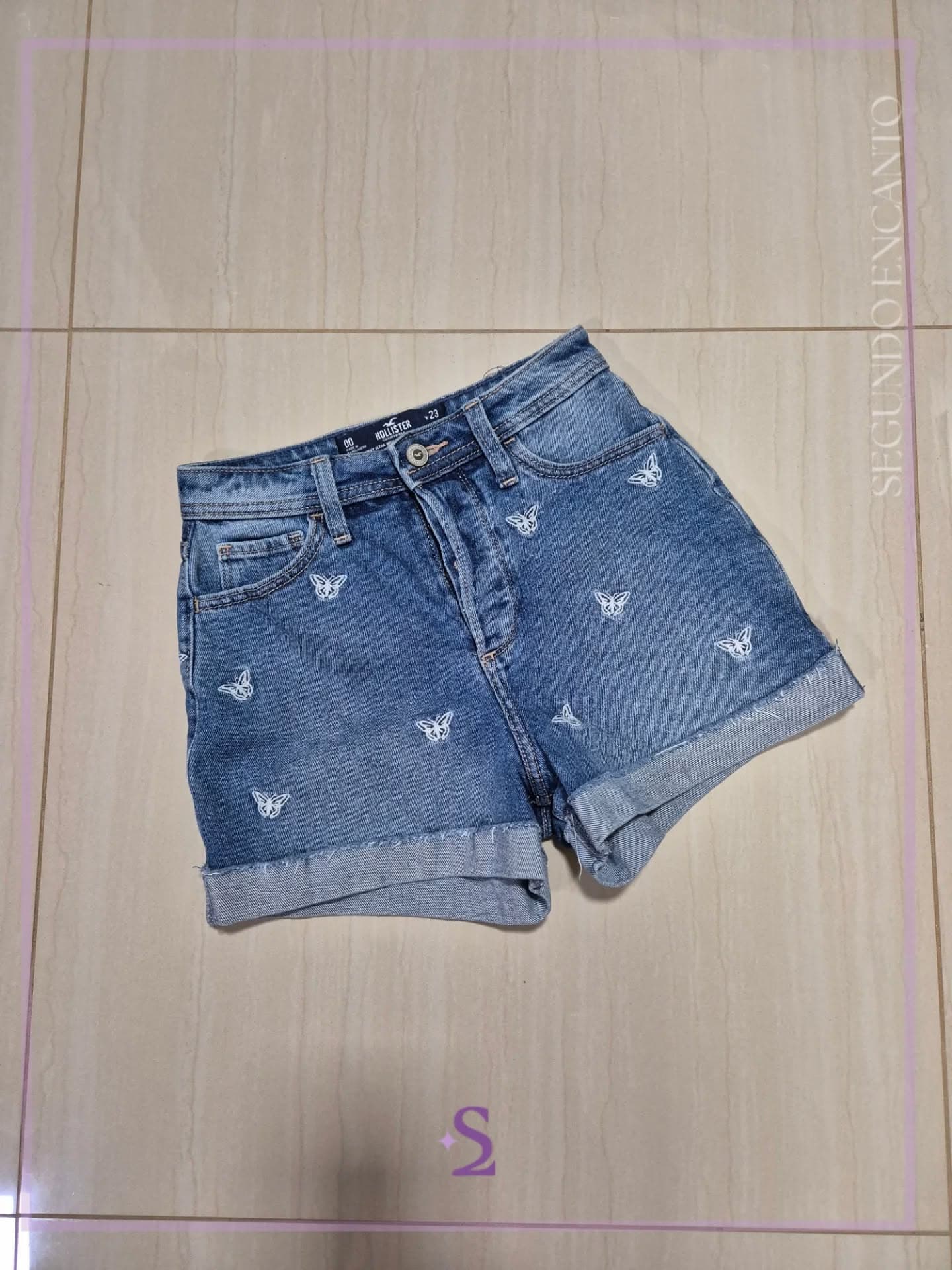 Short denim con mariposas bordadas w23 como XS